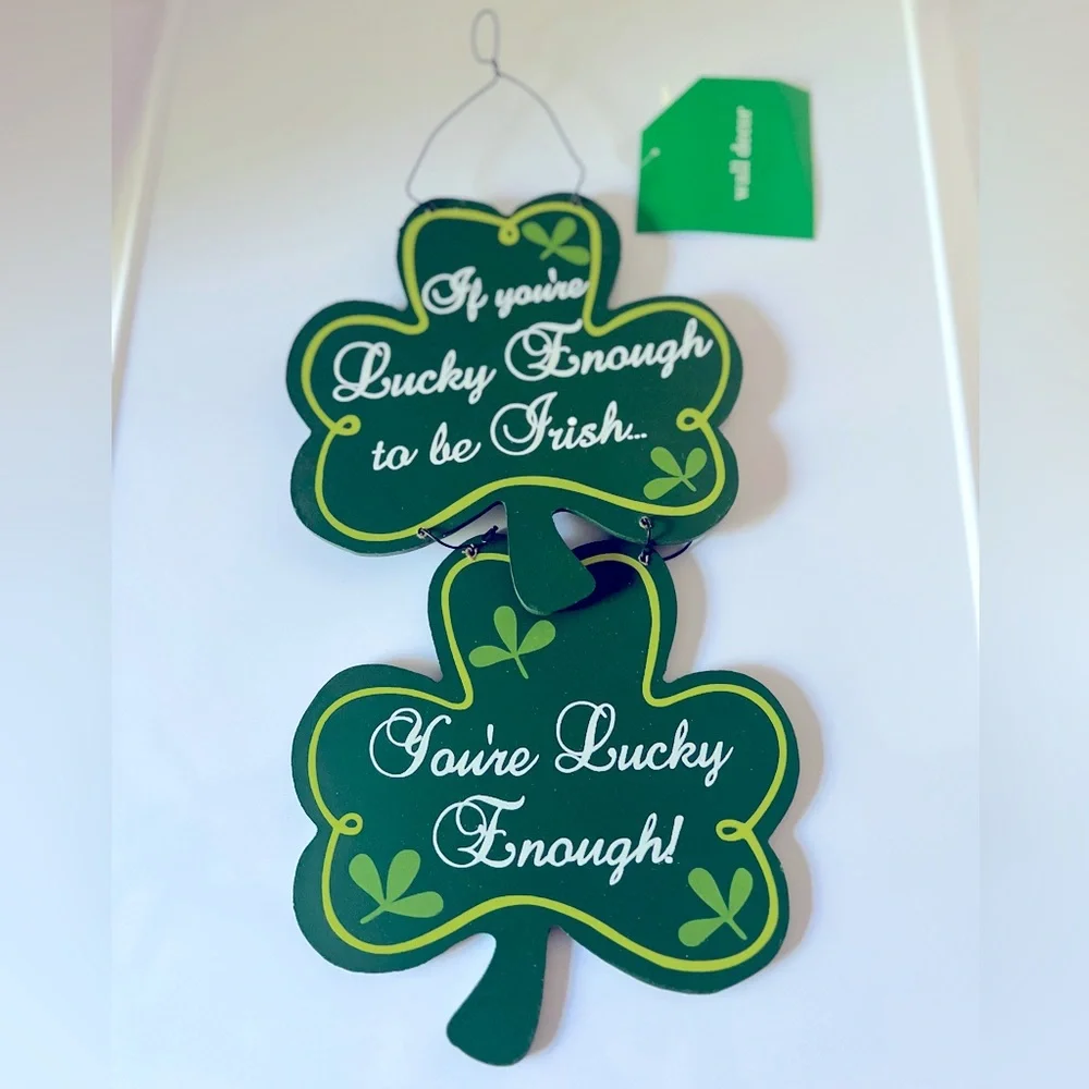 Two Kelly Green Irish Decorations Featuring Shamrocks and Witty Verbiage.